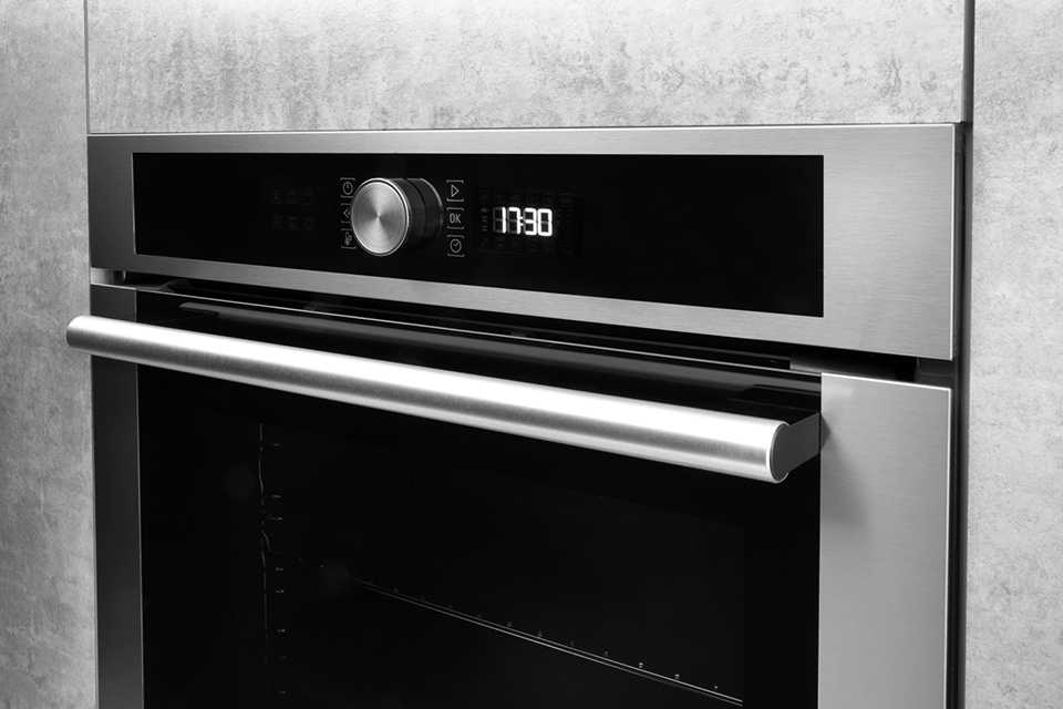 A black oven with automatic cooking controls.