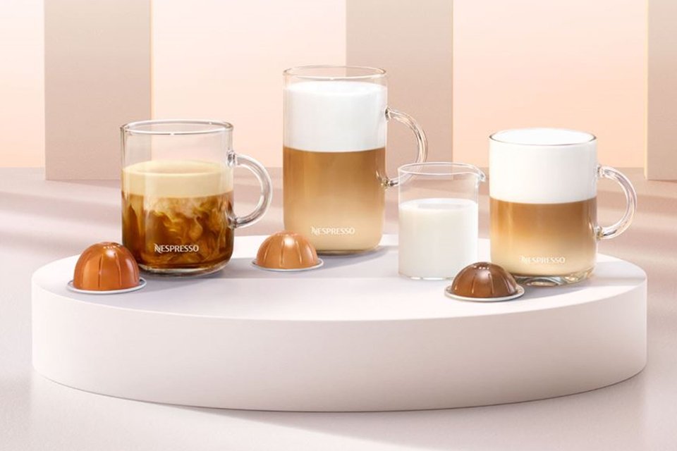 Three cups of barista-style coffee made with Nespresso Vertuo capsules.