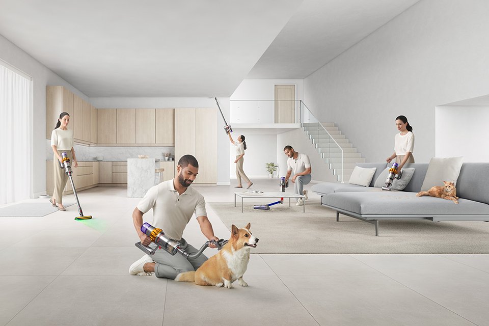 A man and woman using the different dyson accessories for cordless vacuum cleaners across different surfaces and floor types.