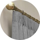 Shop pencil pleat curtains.