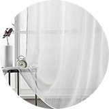 Shop voile panel curtains.