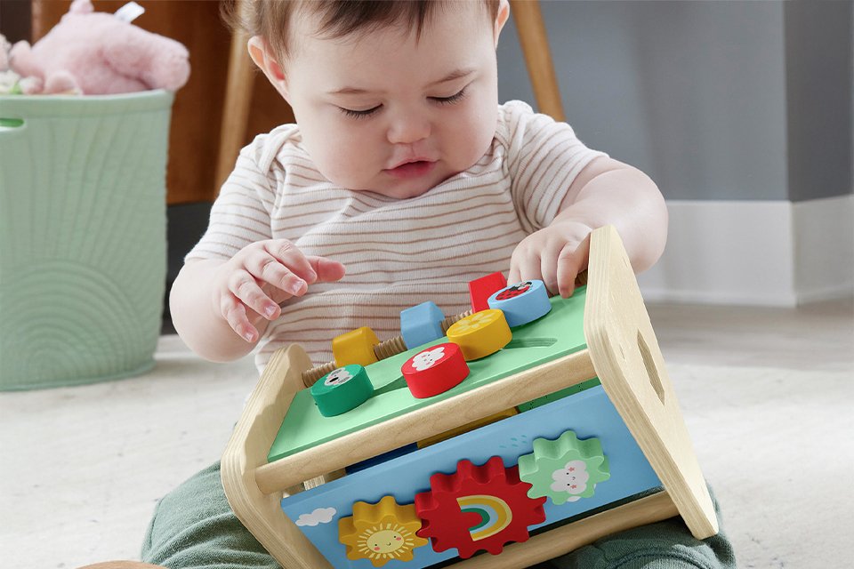 Fisher-Price Wooden Activity Triangle Fine Motor Toy.