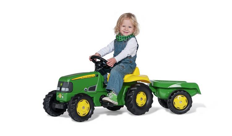 Kids sit on clearance tractor