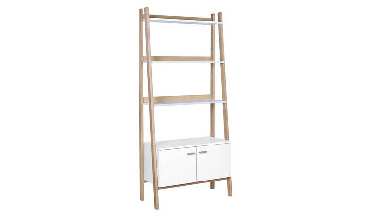 White bookcase store with ladder