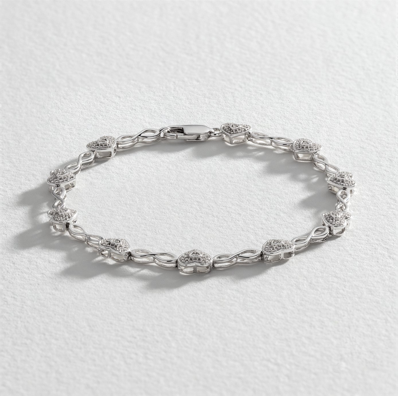 Revere Sterling Silver 0.05ct tw Diamond Heart Bracelet