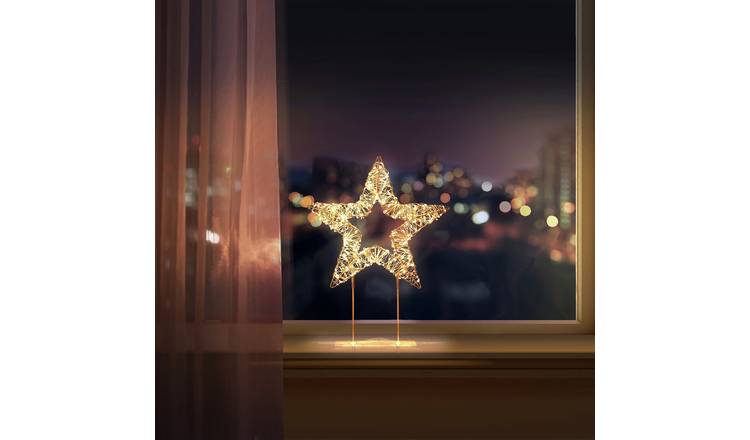 Premier Twinkling 720 LEDs Christmas Table Top Star