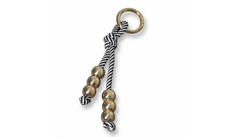 Freedom Gold Tone Beads Black and White Rope Bag Charm