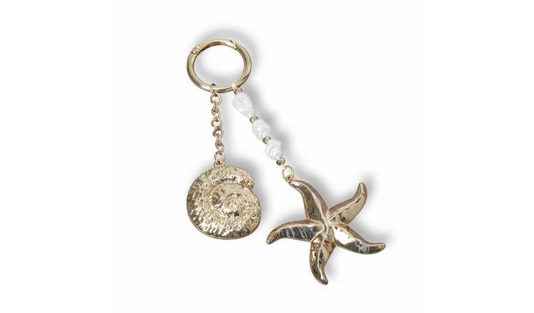 Freedom Gold Tone Shell and Starfish Charms Bag Charm
