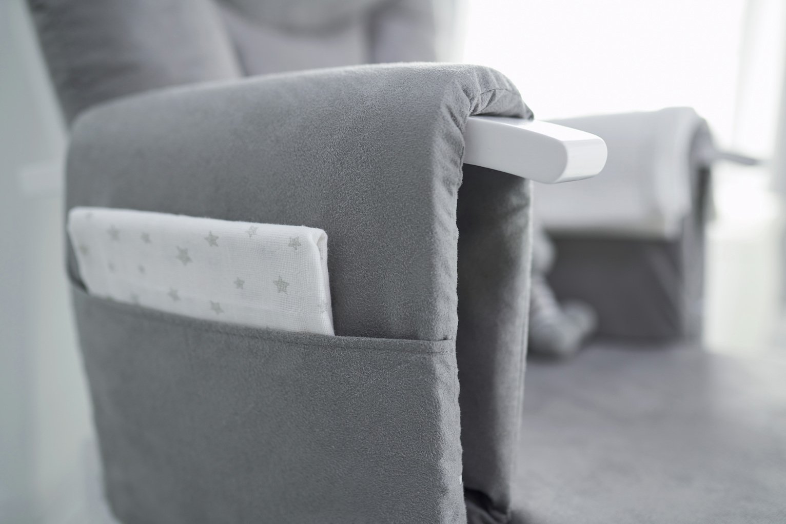 grey and white glider chair