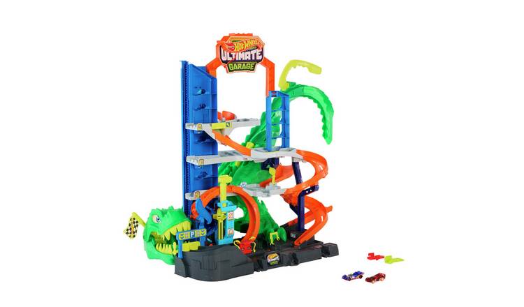Hot Wheels City Ultimate T-Rex Garage with 2 Toy Cars & Storage for 50+