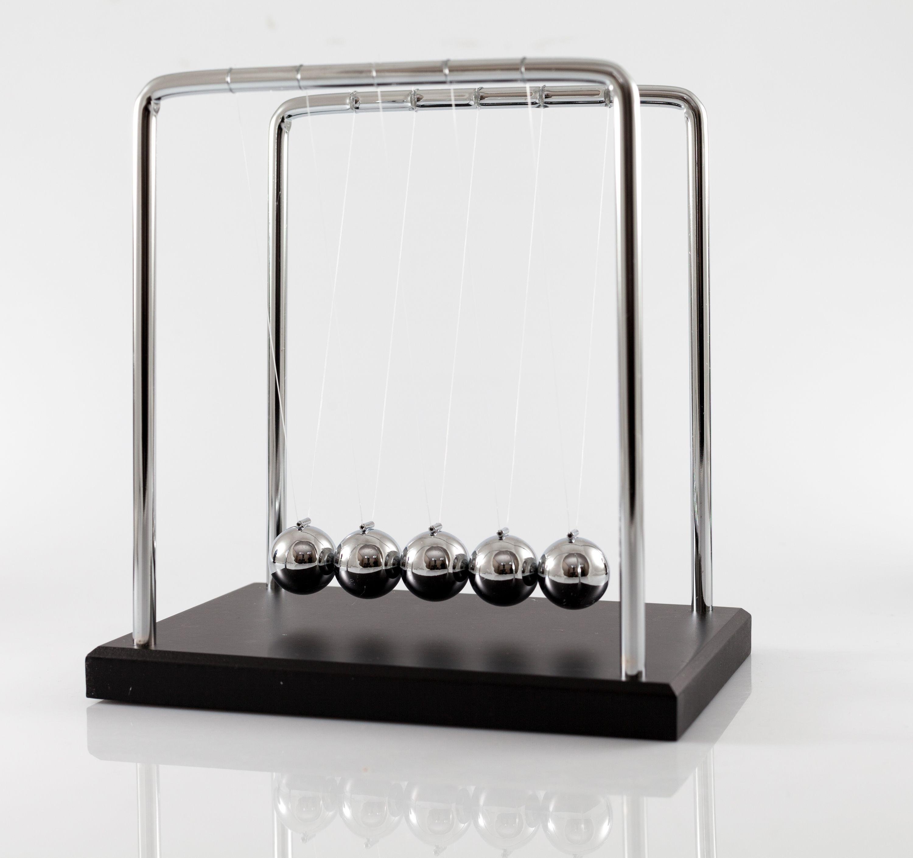 Newtons cradle что это