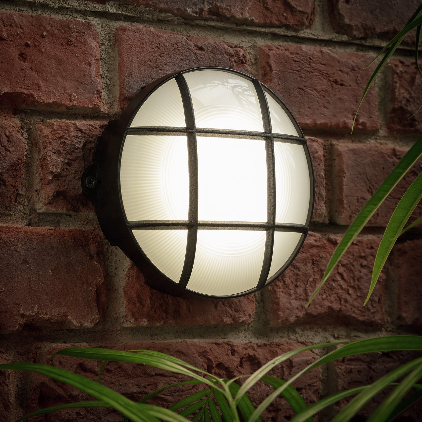 Coast Round Grid Bulkhead LED Outdoor Wall Light