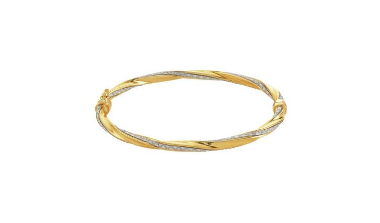 Twisted on sale gold bangle