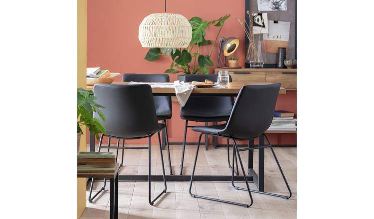 Wood table and online black chairs