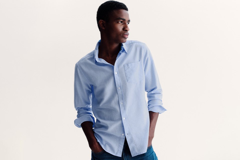 Man in blue shirt with pocket.