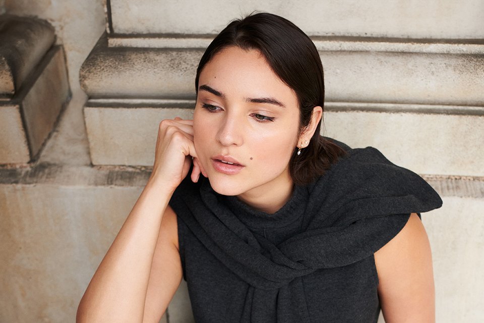 Woman in black jumper set.