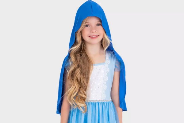 A girl in a fancy dress costume.