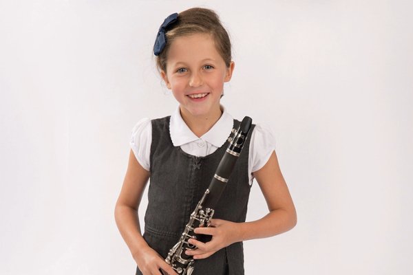 A child with a clarinet.