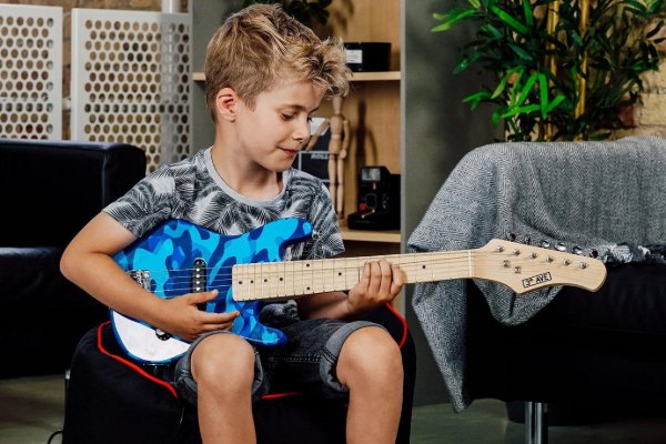 A child playing the guitar.