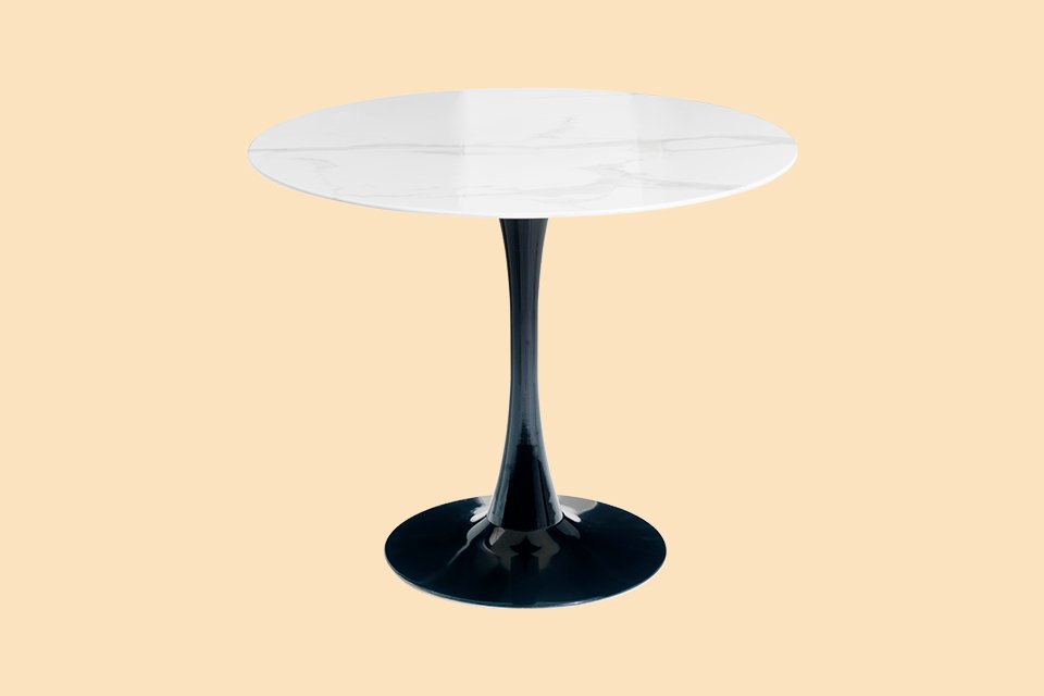 A Habitat Tulip marble effect 4 seater dining table.