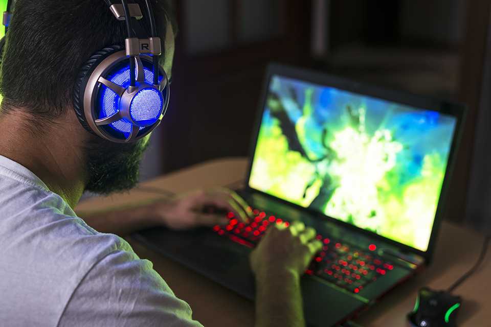 A young gamer playing a video game.