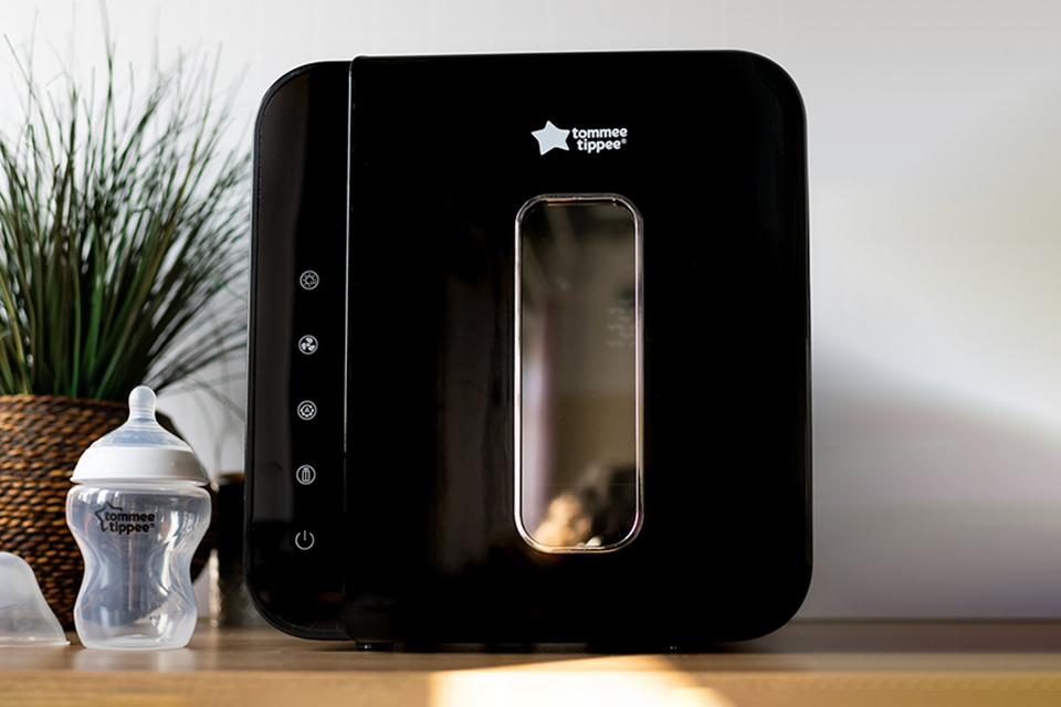 A Tommee Tippee UV sterliser and dryer in black.
