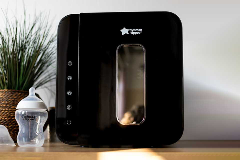 A Tommee Tippee UV sterliser and dryer in black.