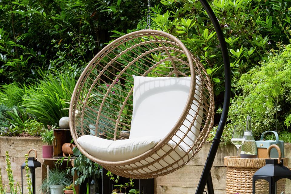 A Habitat 1 seater metal hanging egg chair in natural finish. 