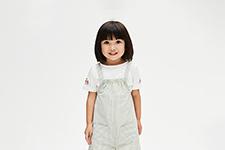 Child in dungarees 