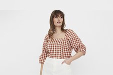 Woman wearing check blouse