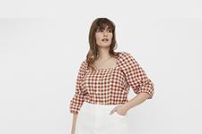 Woman wearing check blouse