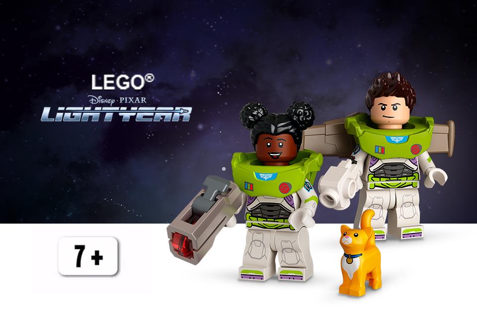 Two LEGO® minifigures wearing costumes from the Lightyear movie and a minifigure of Sox the cat.