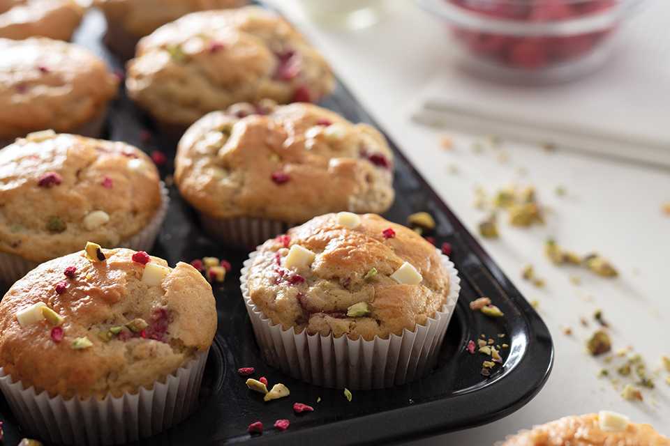 Baked muffins in a muffin tray. 