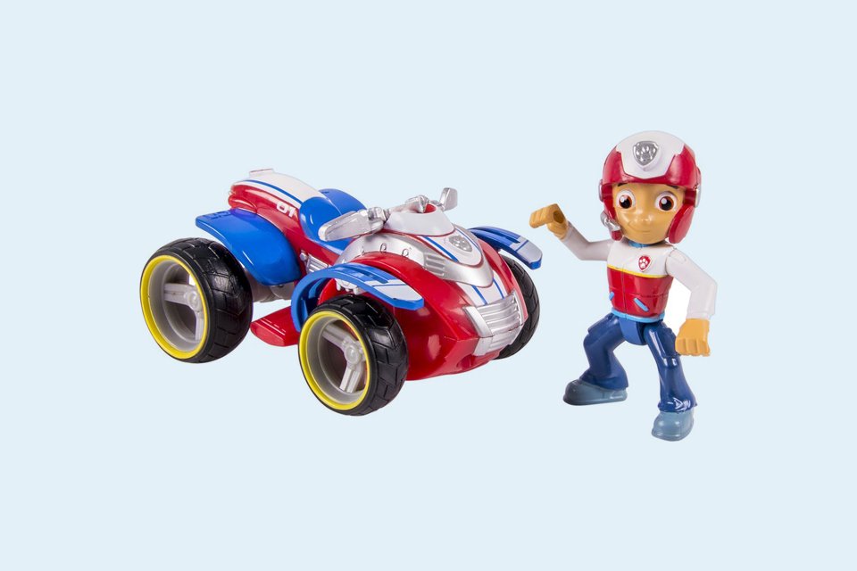 PAW Patrol character Ryder with his toy rescue ATV.