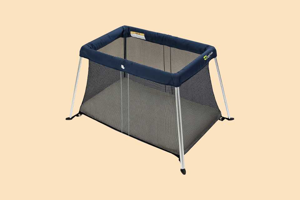 A Cuggl Deluxe Superlight travel cot for babies.