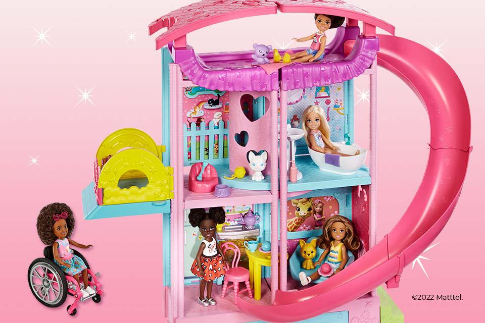 Barbie Chelsea dolls playhouse with a slide and pool.
