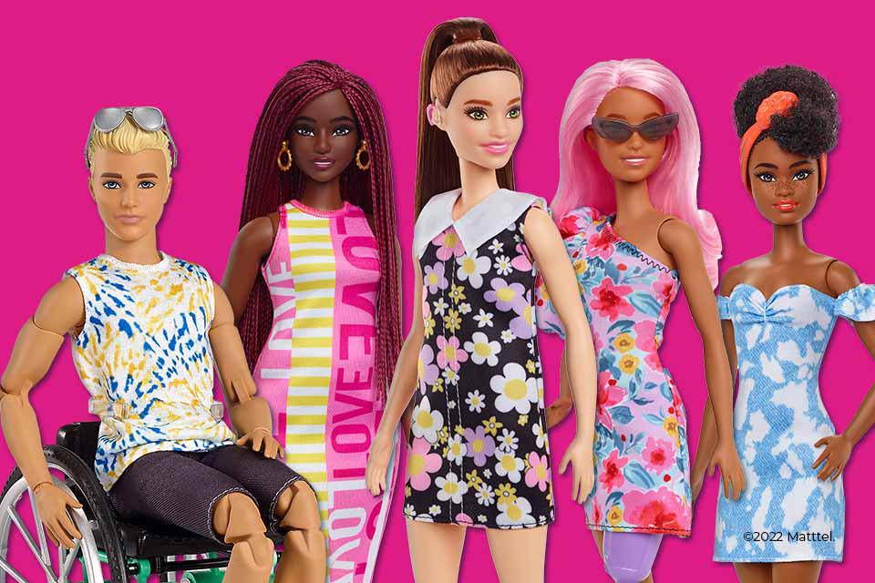 A bunch of inclusive Barbie fashion dolls including Barbie fashionista Ken doll with wheelchair.