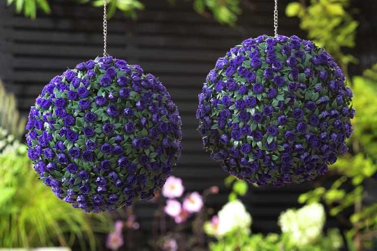 Argos Home purple garden topiary balls.