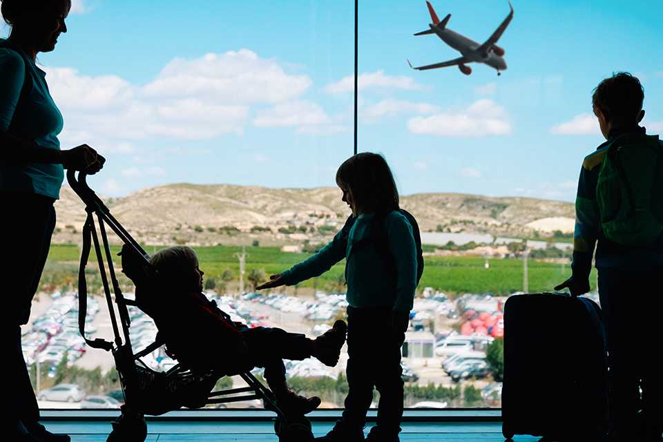 Taking pushchair top on plane