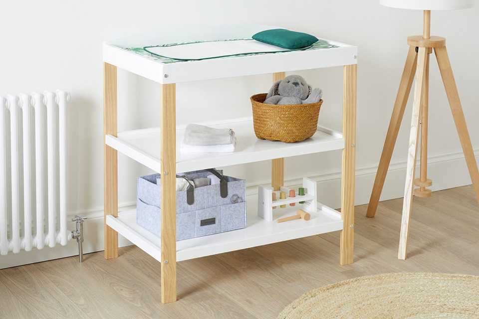 An Ickle Bubba Coleby Scandi white and wood open changing unit.