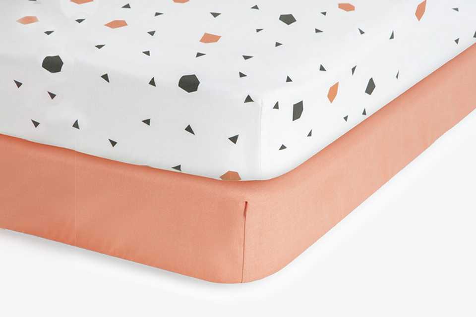 A Habitat Kids cotton geo shapes pack of 2 fitted Sheet.