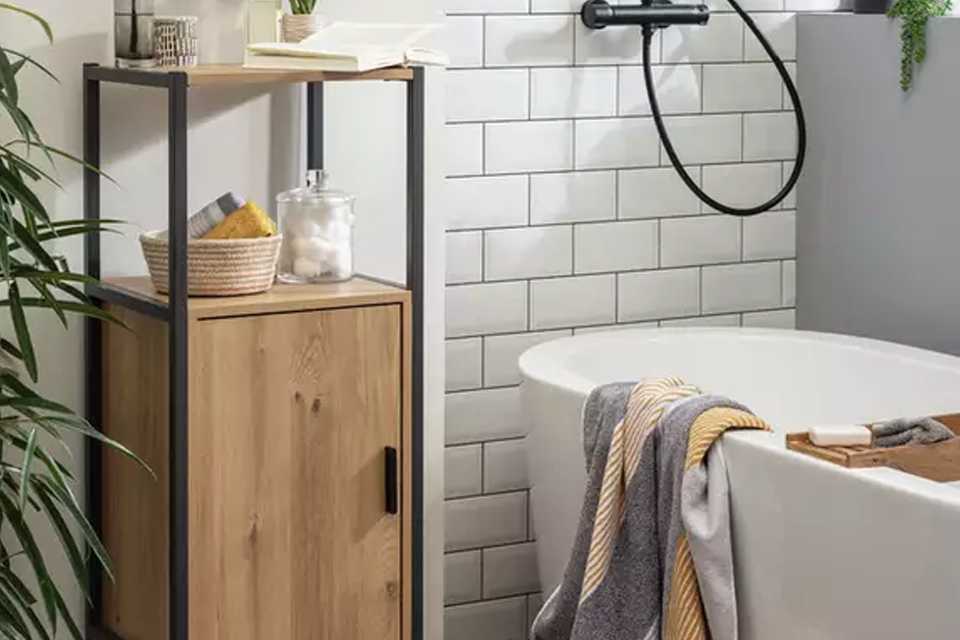  A wooden single cabinet storage in a bathroom.