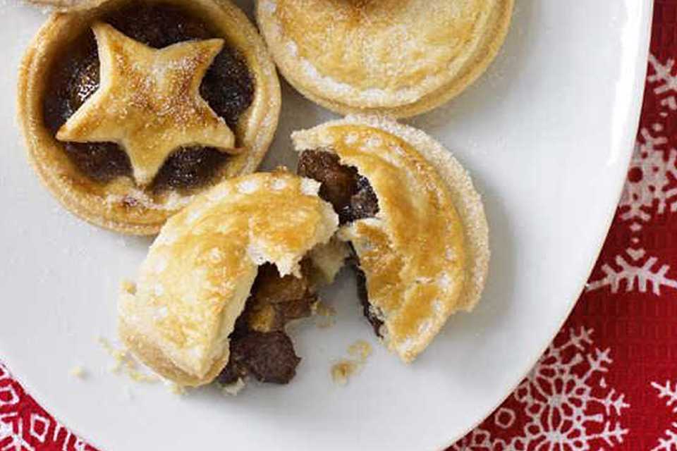 Mince pies on a plate.