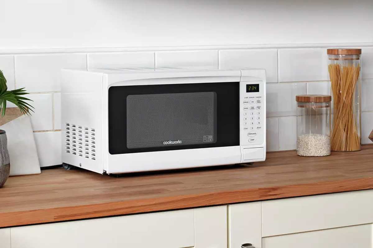 Low wattage microwave kept on a kitchen counter.