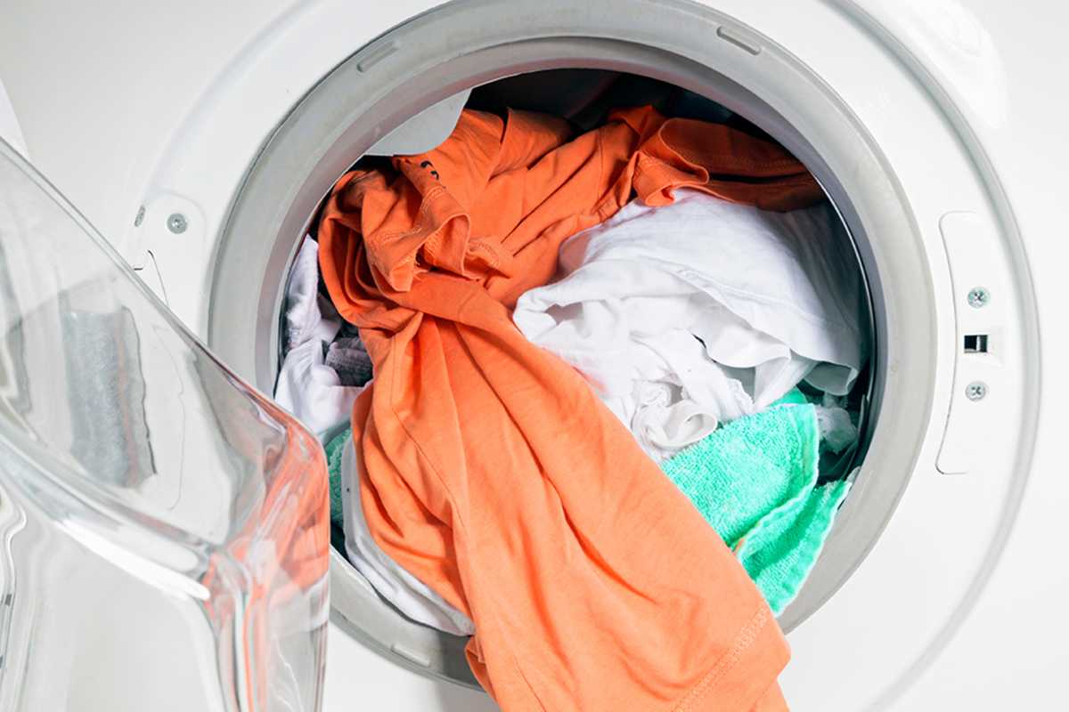 Clothes inside a washing machine.