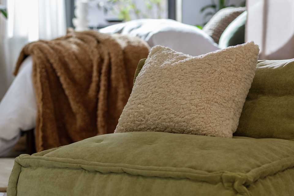 A Habitat quilted bean bag in green colour. 