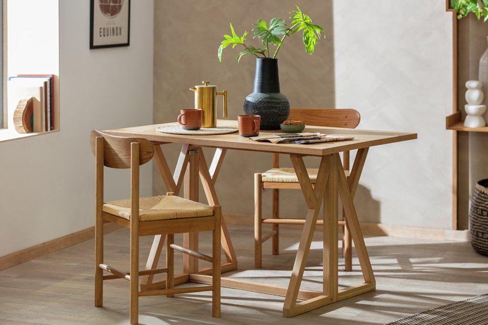 A Habitat Heath oak veneer 4 seater folding table.