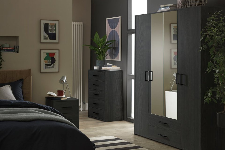 An Argos Home Oslo 3-piece 4-door wardrobe set.