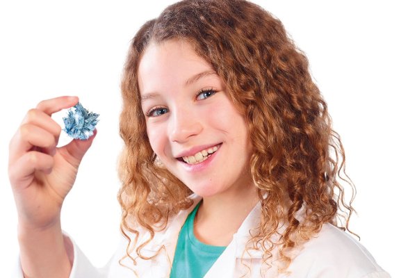 A girl holding a crystal.