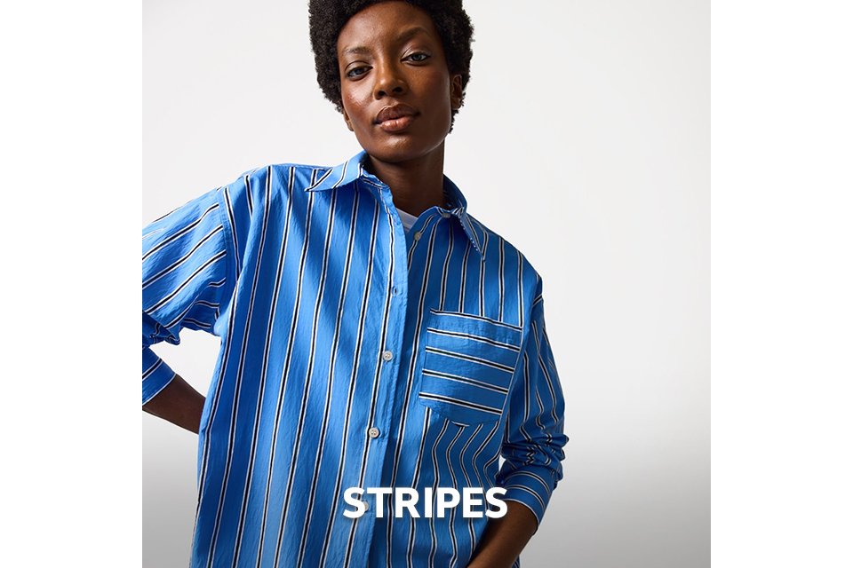 Blue striped button‑up shirt with chest pocket, styled as a relaxed co‑ord look.